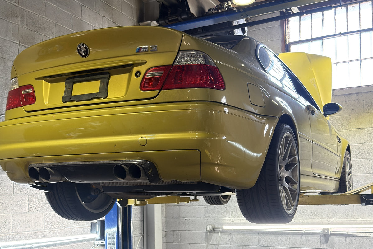 BMW E46 M3 on the lift for winter maintenance at Option Motorsports, Harrison NJ